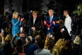Elton John teary-eyed as Biden surprises him with medal at concert