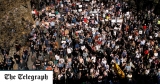 Coronavirus latest news: Police injured in London anti-lockdown protest