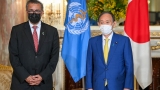 The Latest: EU donating 200M doses of coronavirus vaccines