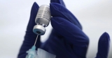 U.S. health official says COVID-19 boosters could risk more serious side effects
