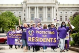 Hundreds of workers push for wages