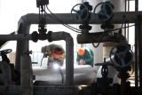 Oil Retreats After China Pledges to Stick With Covid Zero Policy