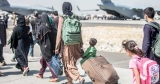 In a global pandemic, Afghan refugees in NC face a challenging health care system | WFAE 90.7