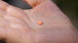 Daily aspirin to prevent heart attacks and strokes could do more harm than good. : Shots