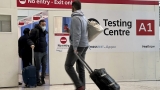 The US ended pre-departure testing for air travelers. Should I still test? : Goats and Soda – NPR