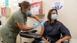 Updated COVID booster shots reduce the risk of hospitalization, CDC reports