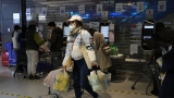 Panic buying grips Beijing as COVID cases rise : NPR