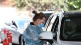 Greg Hunt reveals plan to ship 2000 healthcare professionals to Australia