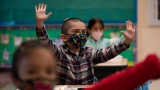 Schools forge ahead without CDC guidance, some leaning away from masks
