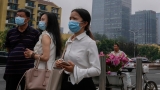 COVID: China’s restrictions curb May 1 holiday travel