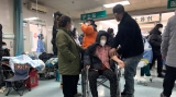 Packed ICUs, crowded crematoriums: COVID roils Chinese towns