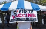 US hits record COVID vaccine distribution pace