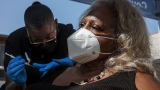 When will COVID-19 vaccines be fully approved—and does it matter whether they are? | Science