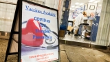 COVID may be no riskier than the flu for many people, some scientists argue : Shots