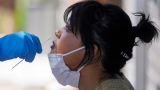 New COVID-19 variants raise limited worries of new spikes