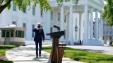 Why is Biden still wearing a mask outside?