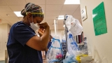 U.S. COVID hospitalizations hit record high : Shots