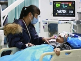 Chinese state media plays down COVID wave