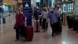 Travelers in Boston react to judge overturning CDC mask mandate