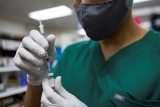 News Wrap: CDC approves boosters for older, high-risk adults – PBS NewsHour