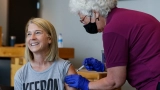 Why the surge of delta cases is prompting a return to tighter health restrictions